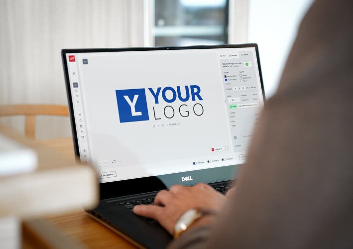 The person uses the logo application tool on the webshop.