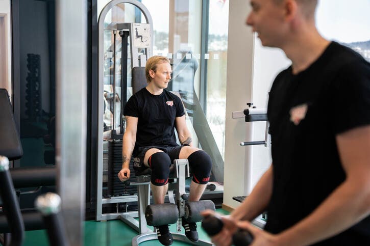 Employees work out in Hot Screen's Gym